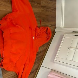 Orange Nike sweatshirt